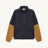 CHAQUETA UNISEX DE NYLON TÉCNICO PARA LA LLUVIA CHAQUETA UNISEX DE NYLON TÉCNICO PARA LA LLUVIA