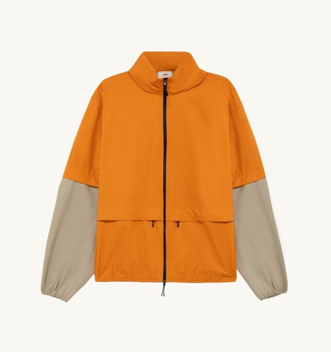CHAQUETA UNISEX DE NYLON TÉCNICO PARA LA LLUVIA CHAQUETA UNISEX DE NYLON TÉCNICO PARA LA LLUVIA