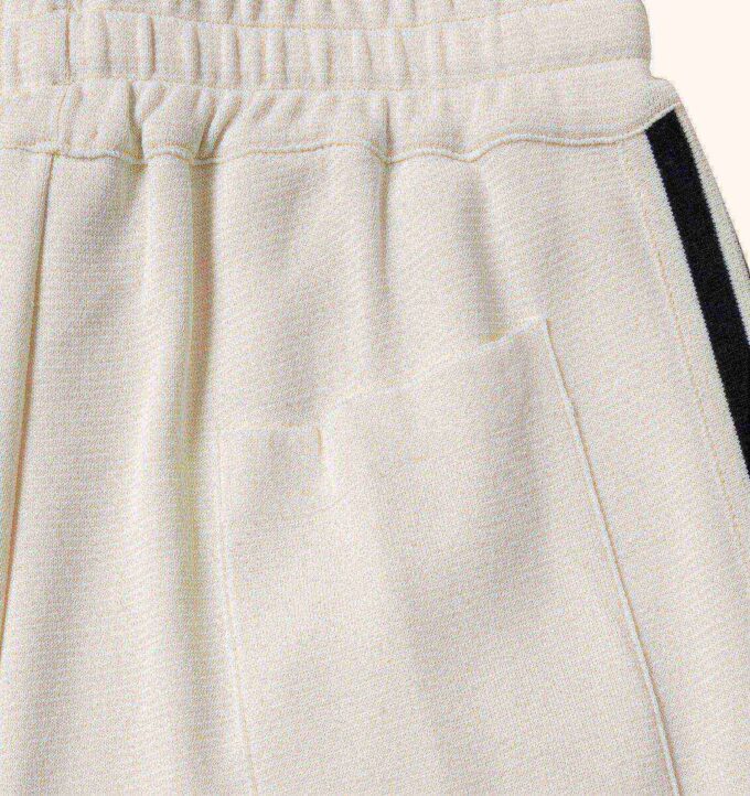 PANTALÓN CORTO DE VISCOSA DE TENIS DE PUNTO PARA HOMBRE