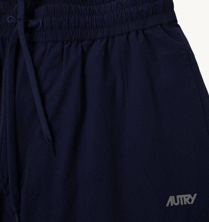 PANTALONES DE JOGGING UNISEX DE NYLON REFLEX