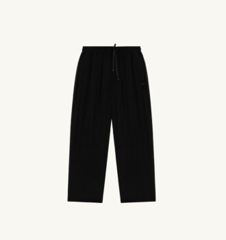 PANTALONES DE NYLON CON LOGO TONAL UNISEX
