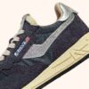 ZAPATILLAS BAJAS REELWIND DE ANTE Y PIEL DE NYLON EN TONOS CARBONO Y PLATEADO ZAPATILLAS BAJAS REELWIND DE ANTE Y PIEL DE NYLON EN TONOS CARBONO Y PLATEADO