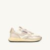 ZAPATILLAS BAJAS REELWIND DE NYLON BLANCO Y PIEL METALIZADA EN TONO DORADO ZAPATILLAS BAJAS REELWIND DE NYLON BLANCO Y PIEL METALIZADA EN TONO DORADO