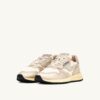 ZAPATILLAS BAJAS REELWIND DE NYLON BLANCO Y PIEL METALIZADA EN TONO DORADO ZAPATILLAS BAJAS REELWIND DE NYLON BLANCO Y PIEL METALIZADA EN TONO DORADO