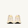 ZAPATILLAS BAJAS REELWIND DE NYLON BLANCO Y PIEL METALIZADA EN TONO DORADO ZAPATILLAS BAJAS REELWIND DE NYLON BLANCO Y PIEL METALIZADA EN TONO DORADO