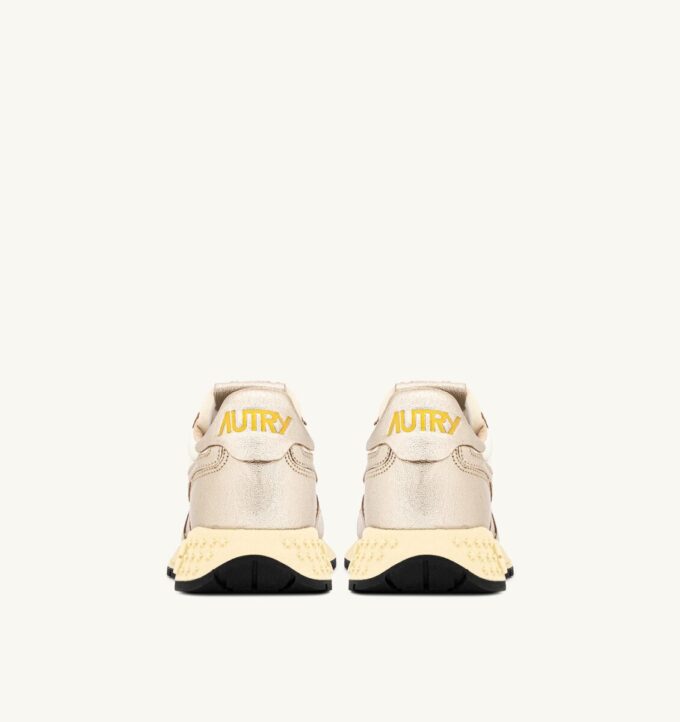 ZAPATILLAS BAJAS REELWIND DE NYLON BLANCO Y PIEL METALIZADA EN TONO DORADO ZAPATILLAS BAJAS REELWIND DE NYLON BLANCO Y PIEL METALIZADA EN TONO DORADO