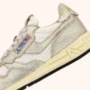 ZAPATILLAS BAJAS REELWIND DE NYLON BLANCO Y PIEL METALIZADA EN TONO DORADO ZAPATILLAS BAJAS REELWIND DE NYLON BLANCO Y PIEL METALIZADA EN TONO DORADO