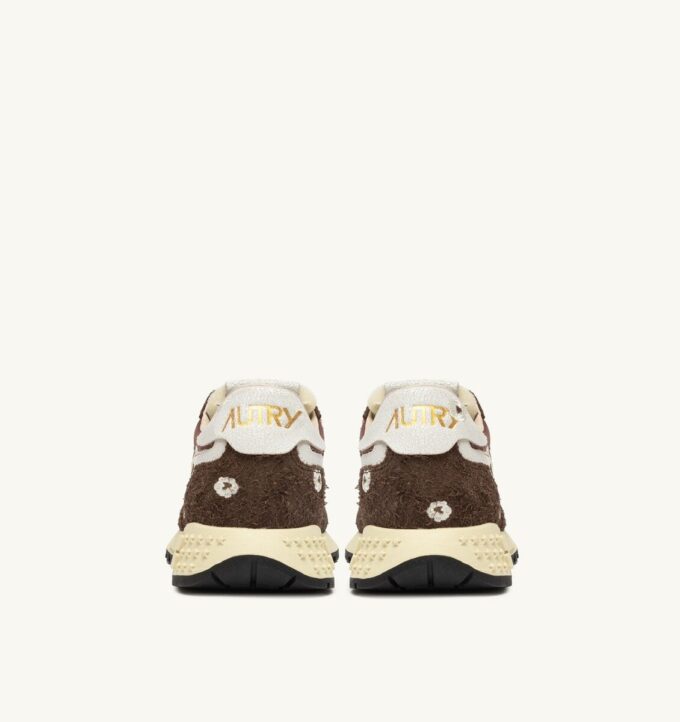ZAPATILLAS BAJAS REELWIND EN ÉBANO Y BORDADO BLANCO ZAPATILLAS BAJAS REELWIND EN ÉBANO Y BORDADO BLANCO