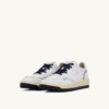 ZAPATILLAS DE GOLF BAJAS EN PIEL BLANCA Y AZUL MARINO