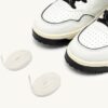 ZAPATILLAS DE GOLF BAJAS EN PIEL BLANCA Y NEGRA