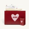 ZAPATILLAS MEDALLISTAS ‘LOVE’ EN PIEL BLANCA Y ROJA