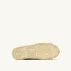 ZAPATILLAS MULE MEDALIST DE PIEL Y BORREGO EN TONO PLATEADO