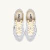 ZAPATILLAS WINDSPIN DE PIEL LAMINADA EN TONO PLATEADO